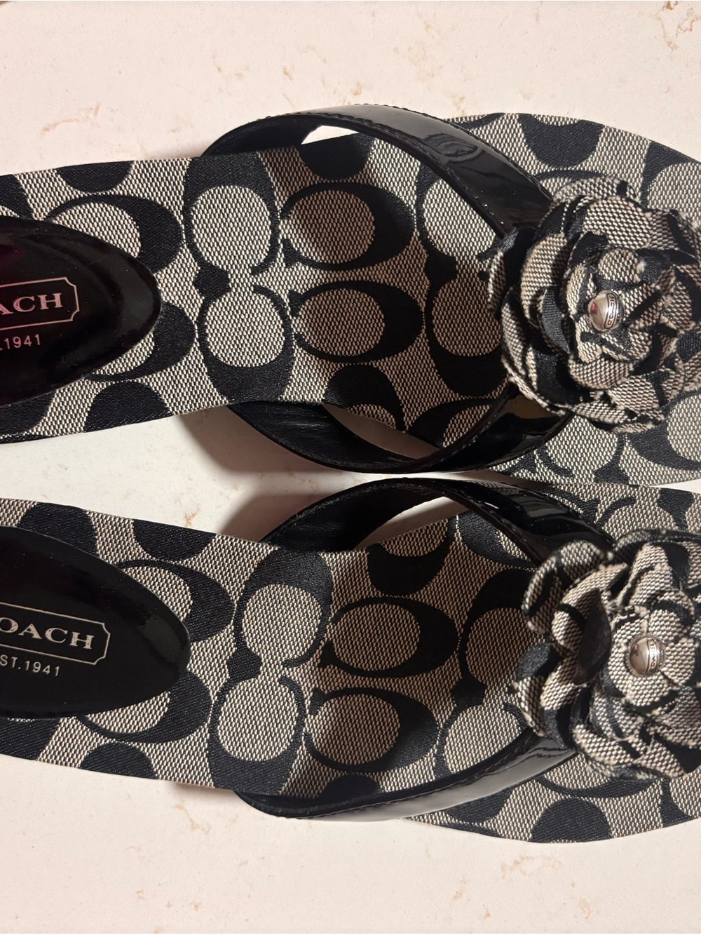Coach Black and gray flip flops with Floral Detail